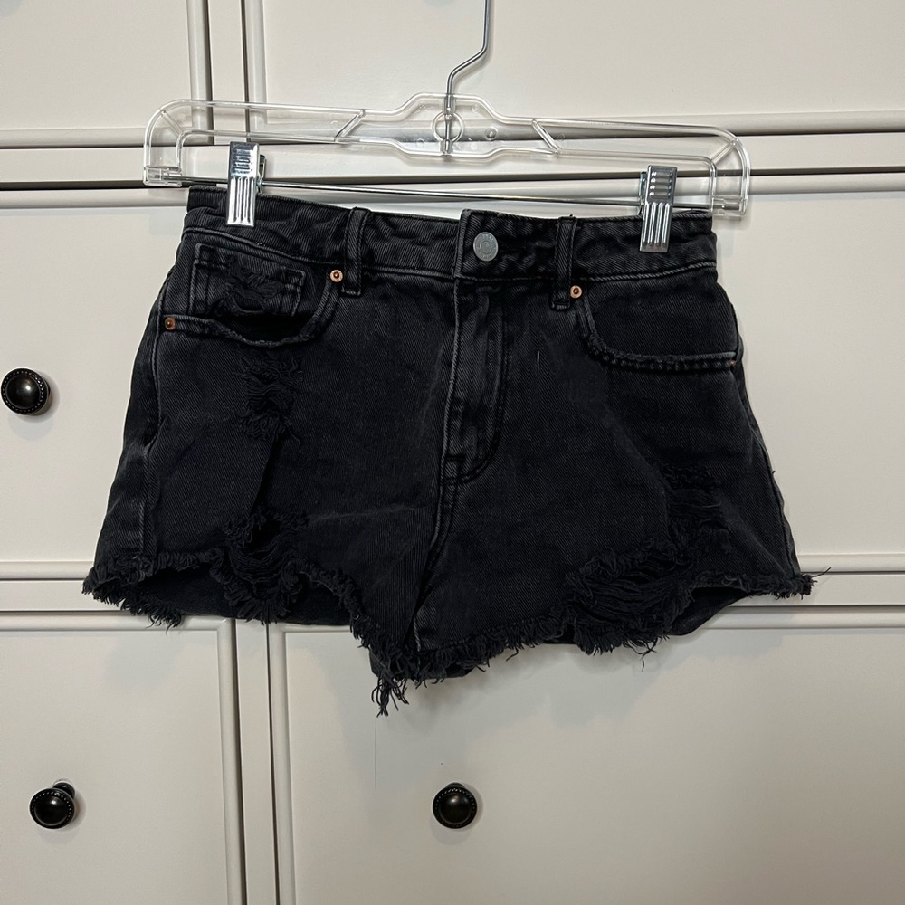 Packing black shorts
